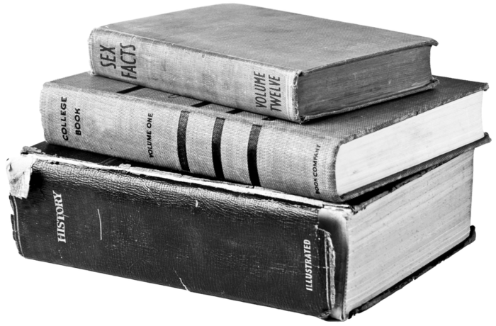 A stack of three books in monochrome