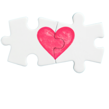 two puzzle pieces fitting together with a heart linking them